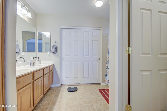 274 S 18th St, Coolidge, AZ 85128 - bathroom featuring tile patterned flooring and vanity