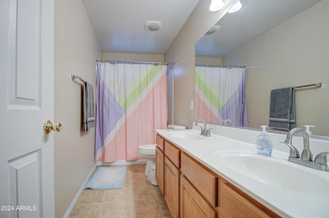 274 S 18th St, Coolidge, AZ 85128 - bathroom featuring tile patterned floors, vanity, and toilet