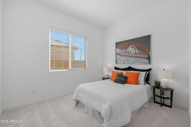 bedroom with light colored carpet