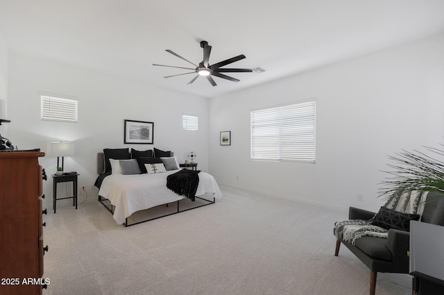 carpeted bedroom featuring ceiling fan