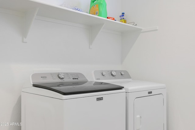 laundry area featuring separate washer and dryer