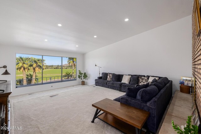 living room with light colored carpet