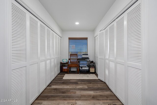 hall with dark hardwood / wood-style floors