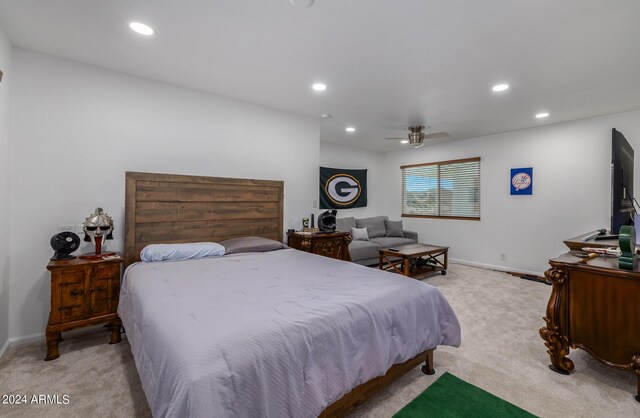 carpeted bedroom featuring ceiling fan