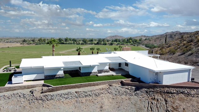 aerial view featuring a mountain view and a rural view