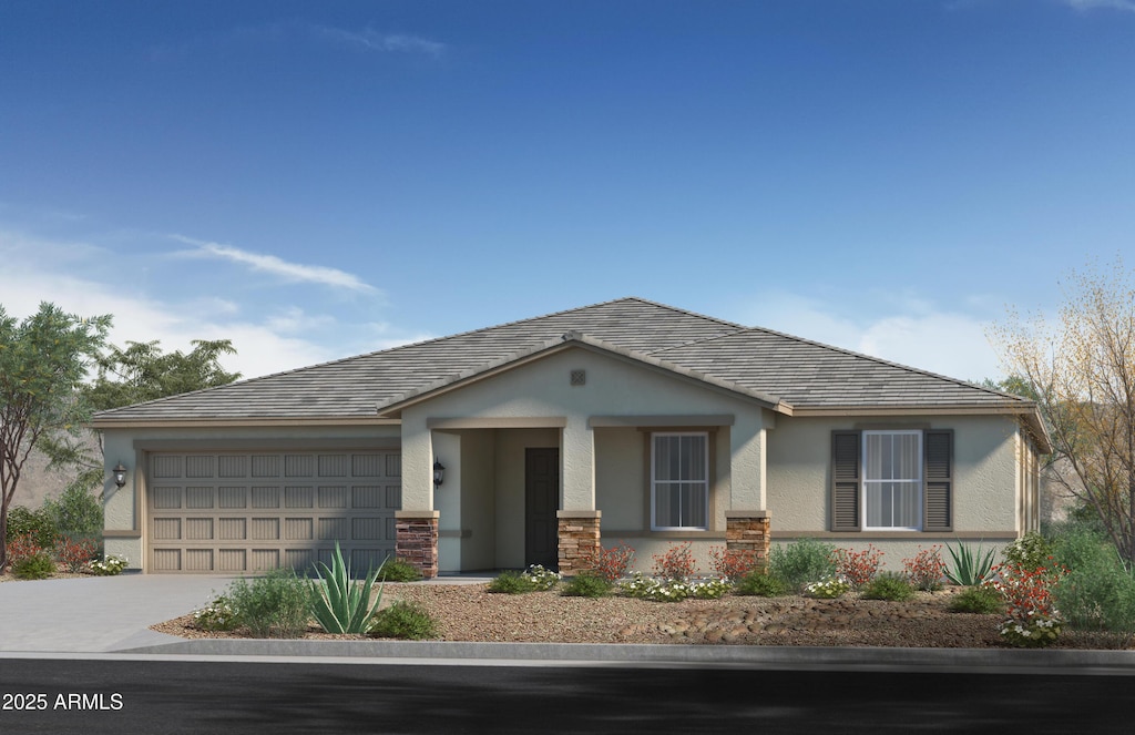 view of front of property with a garage