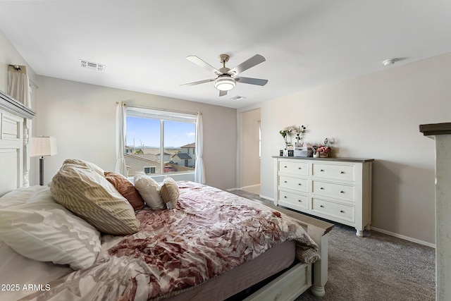 bedroom featuring visible vents, carpet flooring, baseboards, and ceiling fan