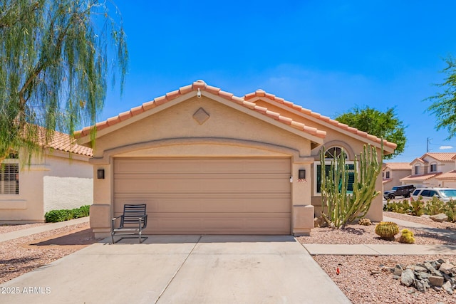 2015 E Glenhaven Dr, Phoenix, AZ 85048 - view of front of house with stucco siding, a tile roof, and a garage