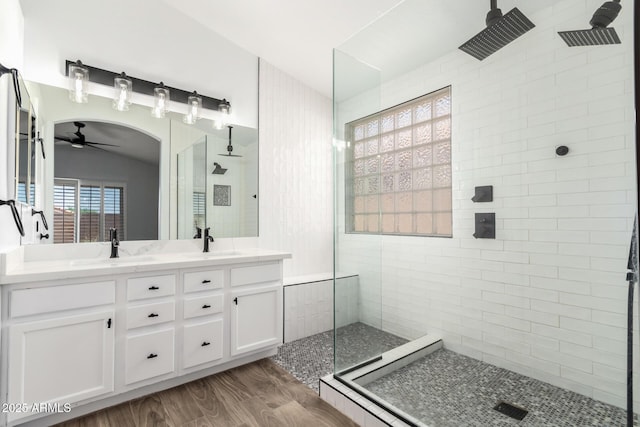 2015 E Glenhaven Dr, Phoenix, AZ 85048 - bathroom with walk in shower, double vanity, a ceiling fan, wood finished floors, and vaulted ceiling