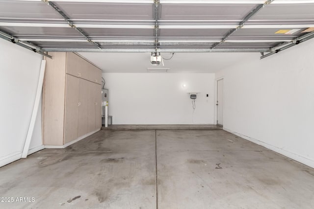 2015 E Glenhaven Dr, Phoenix, AZ 85048 - garage with a garage door opener and water heater