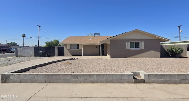 4911 W Merrell St, Phoenix, AZ 85031 - ranch-style house featuring brick siding and concrete driveway