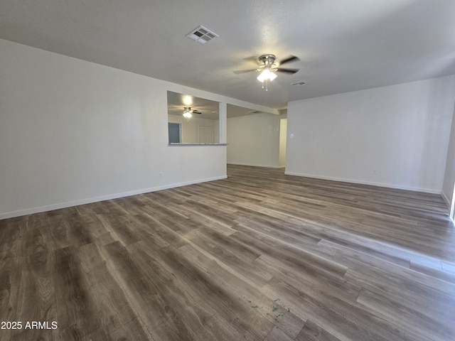 4911 W Merrell St, Phoenix, AZ 85031 - unfurnished room featuring ceiling fan and dark wood-style floors