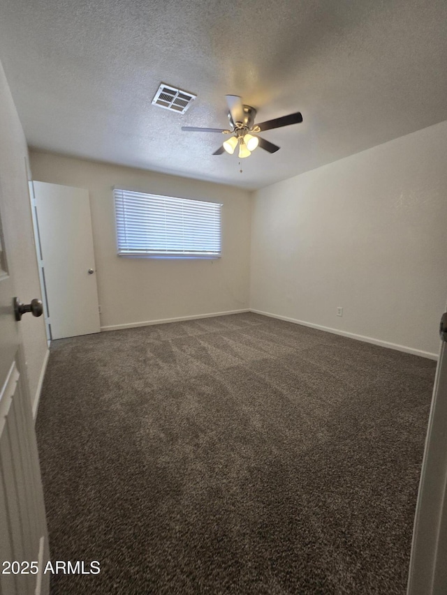 4911 W Merrell St, Phoenix, AZ 85031 - carpeted empty room with ceiling fan and a textured ceiling