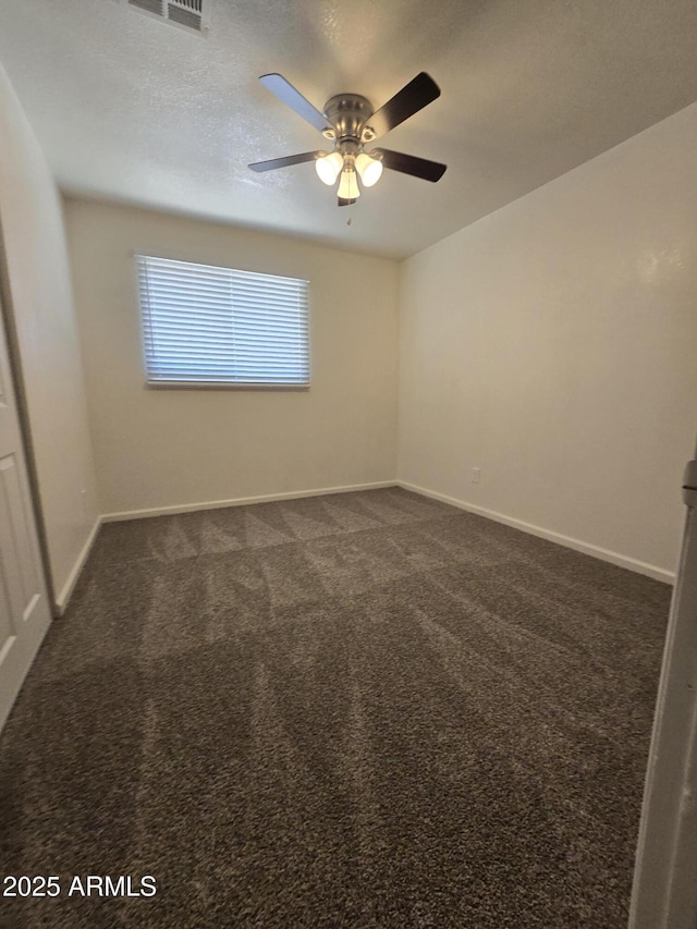 4911 W Merrell St, Phoenix, AZ 85031 - empty room featuring a ceiling fan and dark carpet