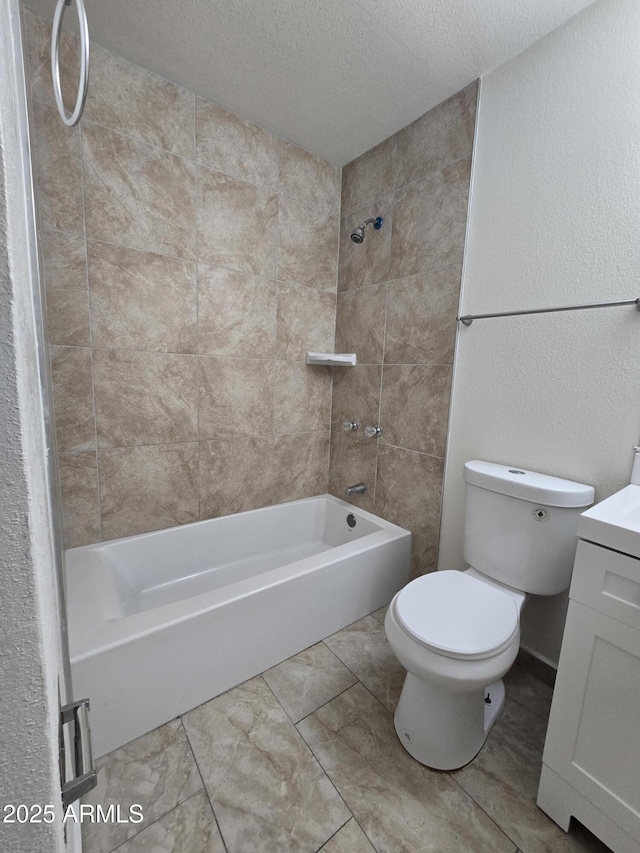 4911 W Merrell St, Phoenix, AZ 85031 - bathroom with vanity, bathing tub / shower combination, and a textured ceiling