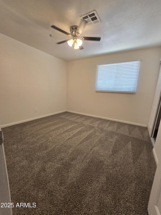 4911 W Merrell St, Phoenix, AZ 85031 - unfurnished room with dark carpet and a ceiling fan