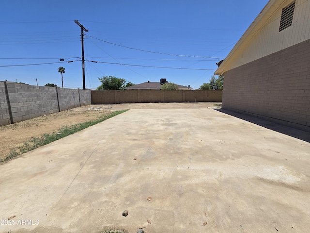 4911 W Merrell St, Phoenix, AZ 85031 - fenced backyard with a patio area