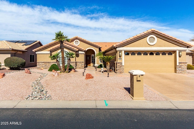 view of front facade featuring an attached garage, concrete driveway, stone siding, a tiled roof, and stucco siding