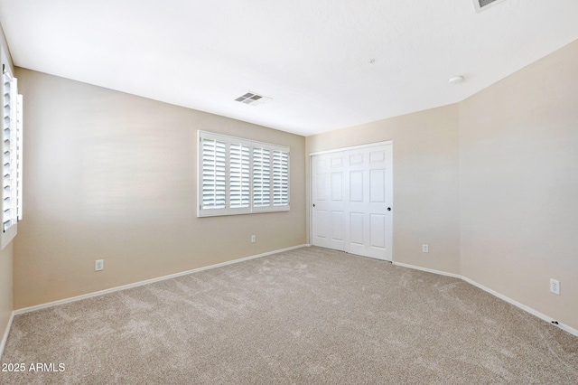 5726 W Park View Ln, Glendale, AZ 85310 - unfurnished bedroom featuring carpet flooring, baseboards, and a closet