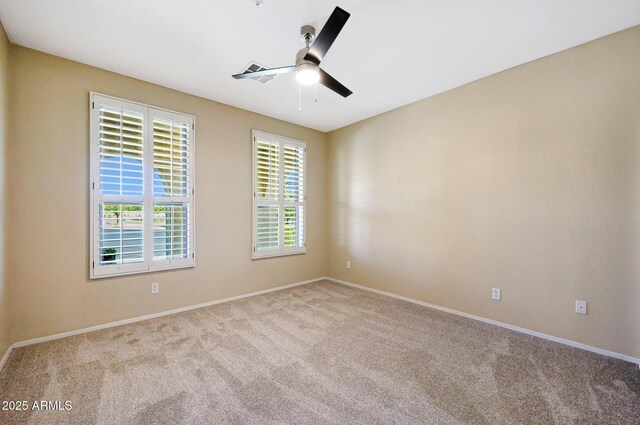5726 W Park View Ln, Glendale, AZ 85310 - unfurnished room featuring carpet floors, ceiling fan, and baseboards