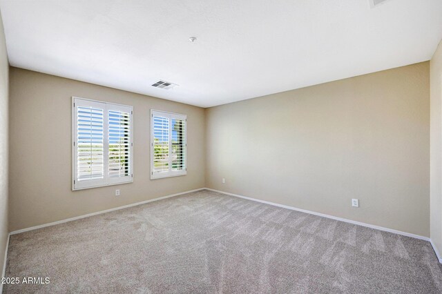 5726 W Park View Ln, Glendale, AZ 85310 - carpeted empty room with baseboards