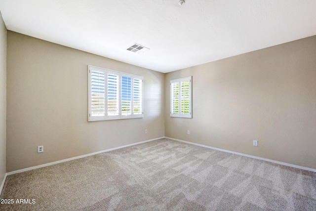 5726 W Park View Ln, Glendale, AZ 85310 - spare room featuring carpet floors and baseboards