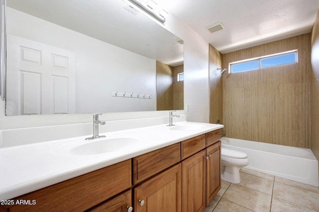 5726 W Park View Ln, Glendale, AZ 85310 - bathroom with toilet, double vanity, shower / bathtub combination, and tile patterned floors