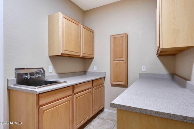 5726 W Park View Ln, Glendale, AZ 85310 - kitchen featuring light brown cabinets, a sink, light countertops, and light tile patterned floors