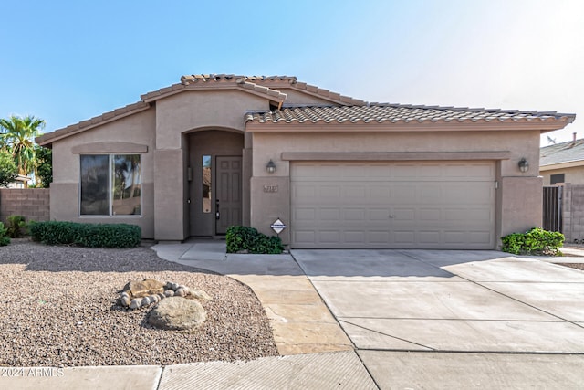 view of front of home with a garage