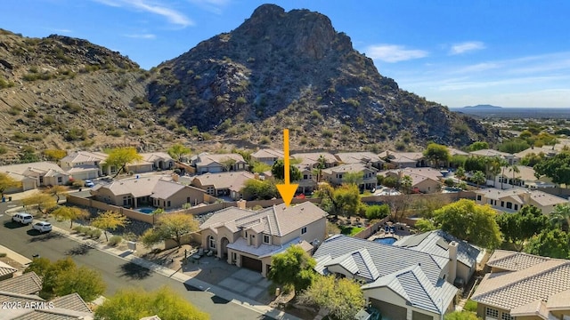 bird's eye view with a mountain view