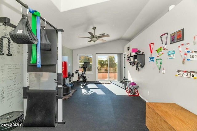 workout area with ceiling fan and vaulted ceiling