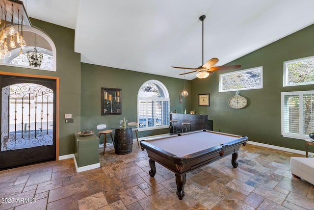 recreation room with ceiling fan, pool table, and high vaulted ceiling