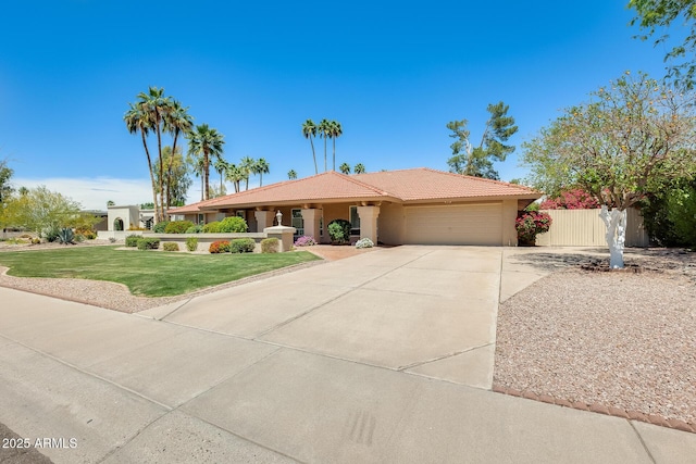 single story home with driveway, a garage, stucco siding, a front yard, and a tiled roof