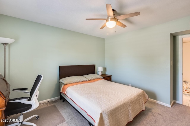 bedroom featuring carpet floors, a ceiling fan, and baseboards