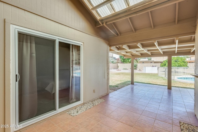 view of patio with a fenced in pool and fence