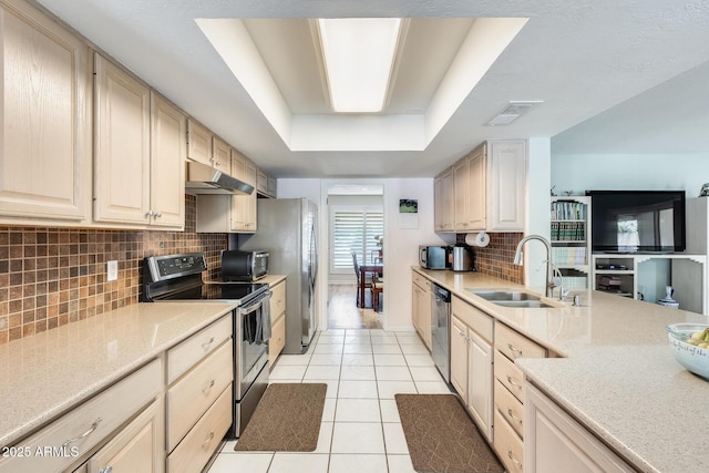 kitchen with light tile patterned floors, a sink, stainless steel appliances, visible vents, and under cabinet range hood