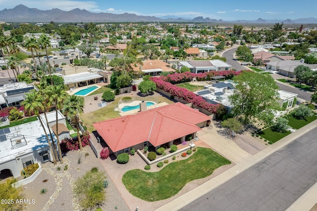 bird's eye view featuring a residential view and a mountain view