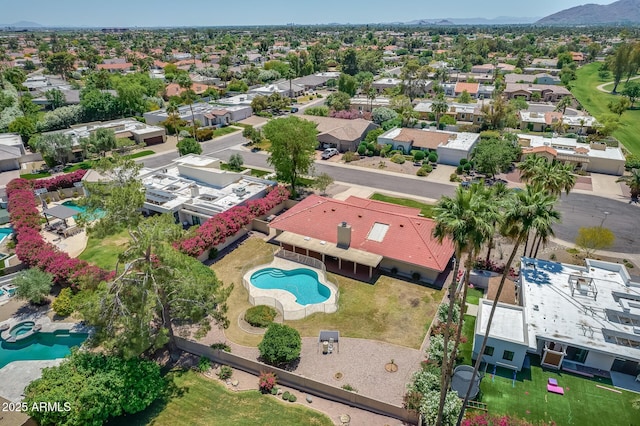 birds eye view of property with a residential view and a mountain view