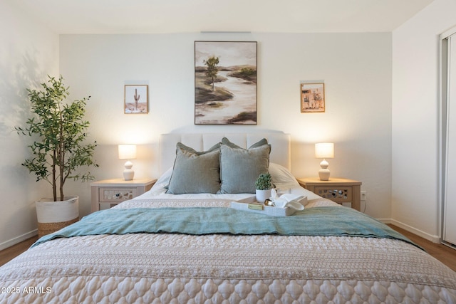 bedroom with wood-type flooring