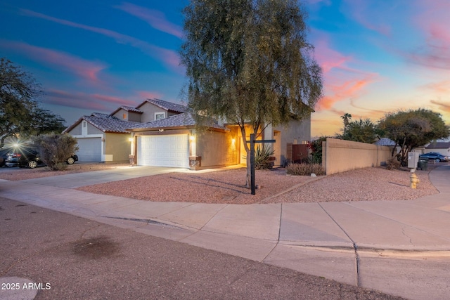 view of front of home with a garage