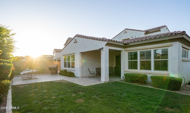 923 W Yellowstone Way, Chandler, AZ 85248 - back of property with a patio and stucco siding