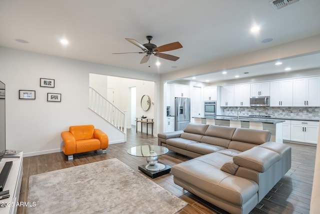 923 W Yellowstone Way, Chandler, AZ 85248 - living room with a ceiling fan, stairs, recessed lighting, and wood finished floors