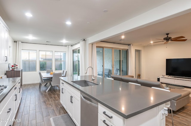 923 W Yellowstone Way, Chandler, AZ 85248 - kitchen featuring stainless steel dishwasher, open floor plan, an island with sink, dark wood finished floors, and recessed lighting