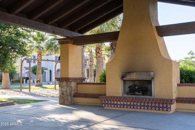 923 W Yellowstone Way, Chandler, AZ 85248 - view of patio / terrace with an outdoor fireplace