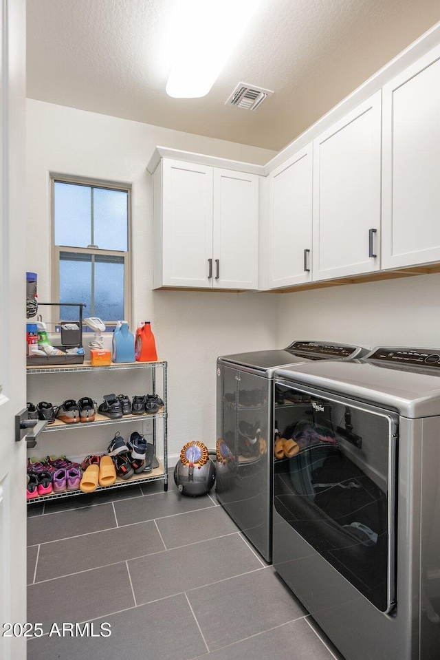 923 W Yellowstone Way, Chandler, AZ 85248 - laundry area featuring separate washer and dryer, cabinet space, and tile patterned floors