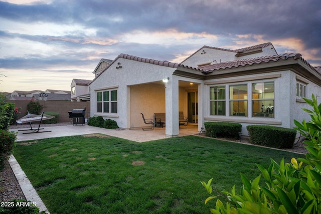 923 W Yellowstone Way, Chandler, AZ 85248 - back of property with a patio and stucco siding