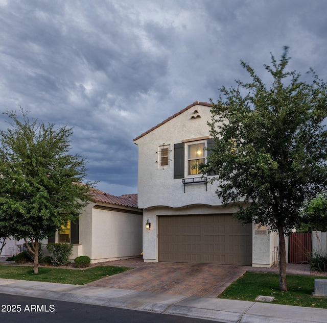923 W Yellowstone Way, Chandler, AZ 85248 - mediterranean / spanish-style house featuring a tile roof, a garage, stucco siding, and decorative driveway