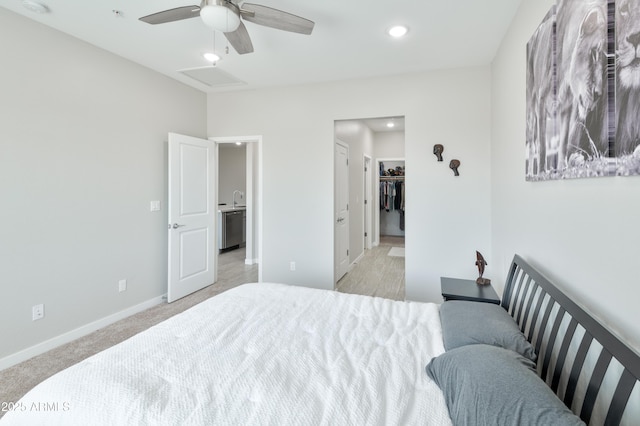 155 N Lakeview Blvd Unit 268, Chandler, AZ 85225 - bedroom with baseboards, recessed lighting, a spacious closet, light carpet, and attic access