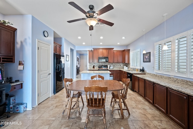 dining space featuring ceiling fan and recessed lighting