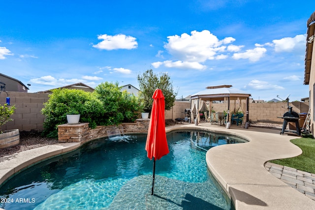 view of swimming pool with a gazebo, a patio area, a fenced backyard, and a fenced in pool